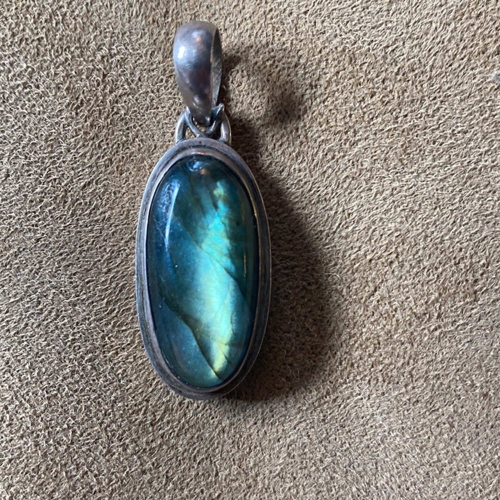 Silver pendant with green stone